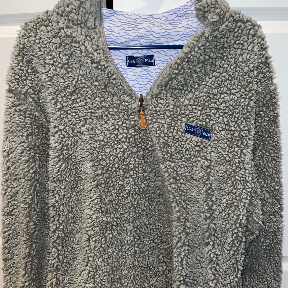 Reversible USA Palm 1/4 zip sweater.